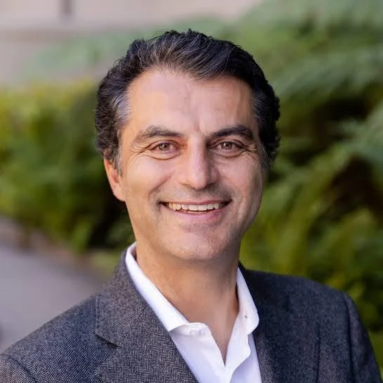 Enrico moretti smiling outside